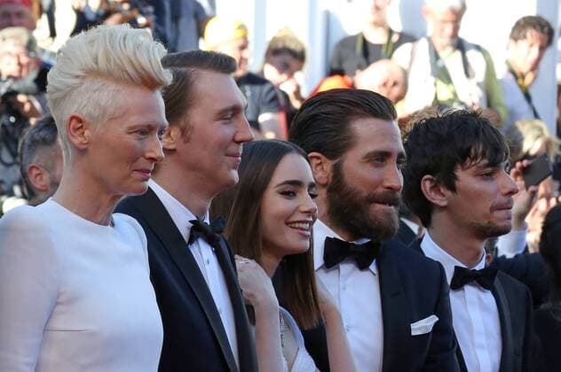 (From L to R) Tilda Swinton, Paul Dano, Lily Collins, Jake Gyllenhaal and Devon Bostic arrive on the red carpet before the screening of the film Okja during the 70th annual Cannes International Film Festival in Cannes, France on May 19, 2017.  CAN20170519104 DAVIDxSILPA