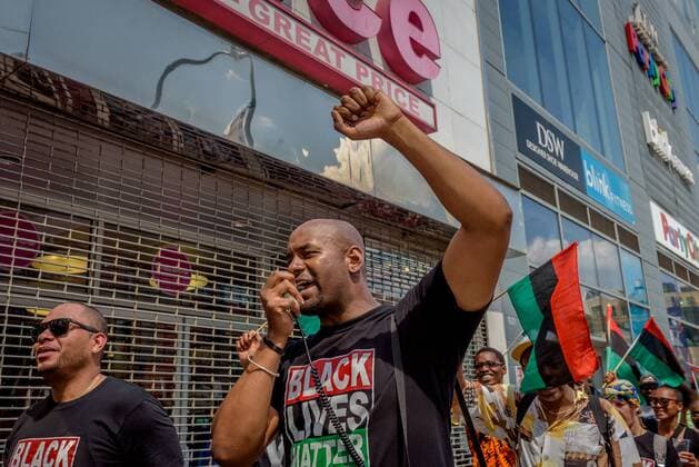 NYC: 28th Malcolm X march In honor of the 92nd Anniversary of the birth of black national hero, Malcolm X, on May 19, 2017; members of December 12th Movement, Black Lives Matter Greater New York and Harlem residents gathered outside Adam Clayton Powell State Office Building, 163 W. 125th St. to hold the 28th annual black power Shut ‘Em Down rally and march.  ErikxMcGregor