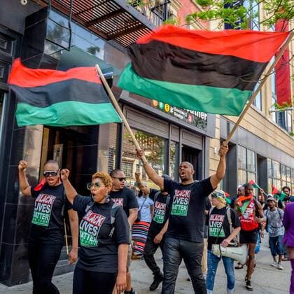 NYC: 28th Malcolm X march In honor of the 92nd Anniversary of the birth of black national hero, Malcolm X, on May 19, 2017; members of December 12th Movement, Black Lives Matter Greater New York and Harlem residents gathered outside Adam Clayton Powell State Office Building, 163 W. 125th St. to hold the 28th annual black power Shut ‘Em Down rally and march.  ErikxMcGregor