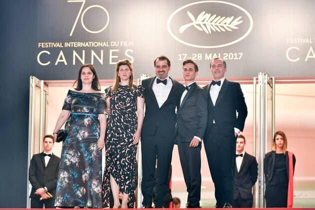 (170520) -- CANNES, May 20, 2017 -- Producer Viktoria Petranyi, screenwriter Kata Weber, director Kornel Mundruczo, actor Zsombor Jeger and actor Merab Ninidze (from L to R) pose for photos on the red carpet for the screening of the film Jupiter s Moon in competition at the 70th Cannes Film Festival in Cannes, France on May 19, 2017. ) (zw) FRANCE-CANNES-70TH CANNES FILM FESTIVAL-JUPITER S MOON-RED CARPET ChenxYichen 