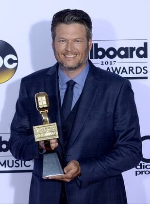 Recording artist Blake Shelton appears backstage with his Top Country Artist award, during the annual Billboard Music Awards held at T-Mobile Arena in Las Vegas, Nevada on May 21, 2017. This year?s show will air live on both coasts at 8 p.m. ET on ABC.  LAV20170521998 JIMxRUYMEN