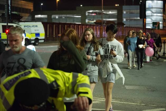 May 23, 2017 - Manchester, England, United Kingdom - People, believed to be leaving the Manchester Arena, after an explosion after the Ariana Grande concert which took place on 05 22 2017 at Manchester Arena in Manchester, United Kingdom on Tuesday, May 23rd, 2017. Greater Manchester Police are treating this as terrorist incident. Manchester United Kingdom  - ZUMAn230 20170523_zaa_n230_036 Copyright: xJonathanxNicholsonx