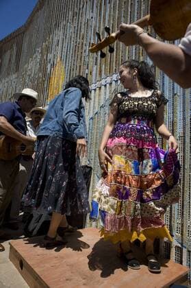 Two women dance on a platform during the 10th annual Fandango Fronterizo music event in Tijuana, Mexico, on May 27, 2017. The event featured musicians and dancers who play the traditional Mexican music called Son Jarocho who played simultaneously on both sides of the border fence. Several hundred people came out for the event. 10th annual Fandango Fronterizo music event in Tijuana !ACHTUNG: NUR REDAKTIONELLE NUTZUNG!  Copyright: xDavidxMaungx MEX71 20170528-636315354068642803