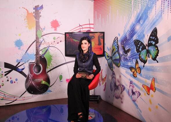 (170528) -- KABUL, May 28, 2017 -- Krishma Naz, 22, presents a music program at Zan TV in Kabul, capital of Afghanistan, May 23, 2017. The first-ever woman television channel, Zan TV, in Afghanistan has been established recently to highlight the rights of Afghan women, improve their status and ensure their equity with men in the conservative society.)(gj) AFGHANISTAN-KABUL-TV STATION-WOMAN RahmatxAlizadah 