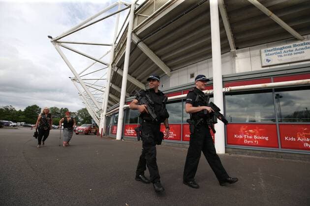 . 28 05 2017. Darlington, United Kingdom. Armed police at UB40 gig. Northern Echo Arena. Armed police patrol outside The Northern Echo arena in Darlington while it hosts a music event including bands UB40 and Level 42.  xChrisxBoothx xi-Imagesx IIM-15204-0004