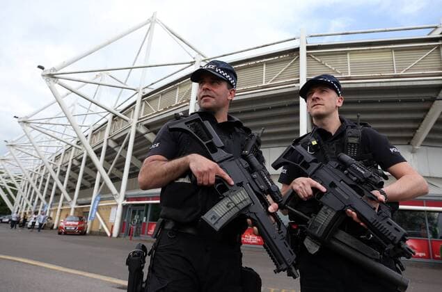 . 28 05 2017. Darlington, United Kingdom. Armed police at UB40 gig. Northern Echo Arena. Armed police patrol outside The Northern Echo arena in Darlington while it hosts a music event including bands UB40 and Level 42.  xChrisxBoothx xi-Imagesx IIM-15204-0006