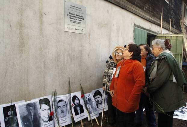 Relatives of missing peaople watch the plate of Colonia Dignidad, German settlement that worked for decades as a State inside the State, enslaving its own citizens and used as torture and death camp during the dictatorship, in Parral, 380 kms south Santiago de Chile, Chile, 28 May 2017. A part of the facilities were declared National Monument and the relatives of the victims unveiled a plate to acknowledge the human rights violantions happened at the time on the occasion of the Day of Cultural Heritage. A MILLION CHILEANS CELEBRATE THE DAY OF CULTURAL HERITAGE !ACHTUNG: NUR REDAKTIONELLE NUTZUNG!  Copyright: xBENJAMINxHERNANDEZx PAR001 20170529-636316156116303265