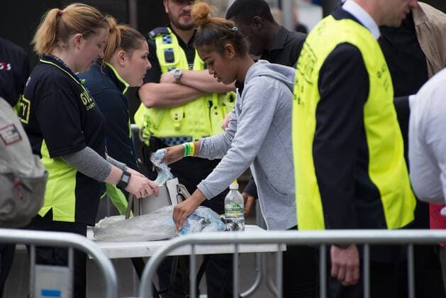 June 4, 2017 - Trafford, England, United Kingdom - Security personel checks the bag of a person attending the One Love Manchester benefit concert at the Old Trafford cricket ground in Trafford, United Kingdom, Sunday, June 04, 2017. The One Love Benefit concert has been organised as tribute to the victims of the Manchester Arena attack at which Ariana Grande performed at the Manchester Arena on 05 22 2017. Trafford United Kingdom  - ZUMAn230 20170604_zaa_n230_153 Copyright: xJonathanxNicholsonx
