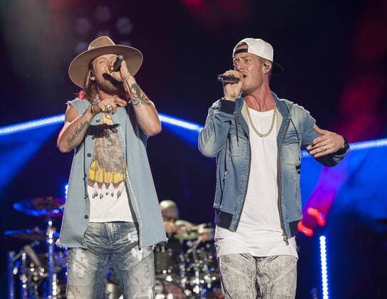 Jun. 10, 2017 - Nashville, Tennessee; USA - Singer TYLER HUBBARD and BRIAN KELLEY of the band Florida Georgia Line performs at Nissan Stadium as part of the 2017 CMA Music Festival that is taking place in downtown Nashville. The four day country music festival will attract thousands of fans from around the world to see a variety of artist on multiple stages. Copyright 2017 . Nashville USA - ZUMAm78_ 20170610_zaf_m78_023 Copyright: xJasonxMoorex