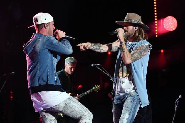 June 10, 2017 - Nashville, Tennessee, United States - 10 June 2017 - Nashville, Tennessee - Brian Kelley and Tyler Hubbard, Florida Geogria Line. 2017 CMA Music Festival Nightly Concert held at Nissan Stadium. Photo Credit: Dara-Michelle Farr AdMedia Nashville United States - ZUMAa123 20170610_zaa_a123_442 Copyright: xDara-MichellexFarr Admediax