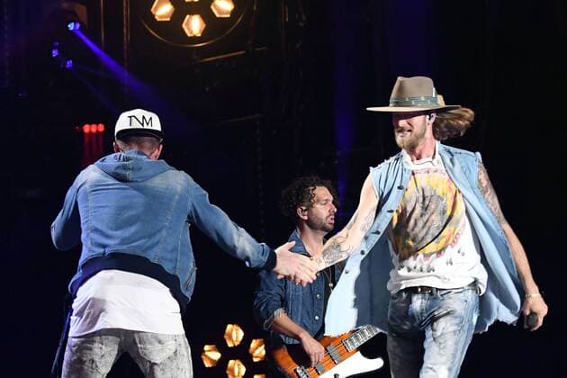June 10, 2017 - Nashville, Tennessee, United States - 10 June 2017 - Nashville, Tennessee - Brian Kelley and Tyler Hubbard, Florida Geogria Line. 2017 CMA Music Festival Nightly Concert held at Nissan Stadium. Photo Credit: Dara-Michelle Farr AdMedia Nashville United States - ZUMAa123 20170610_zaa_a123_449 Copyright: xDara-MichellexFarr Admediax