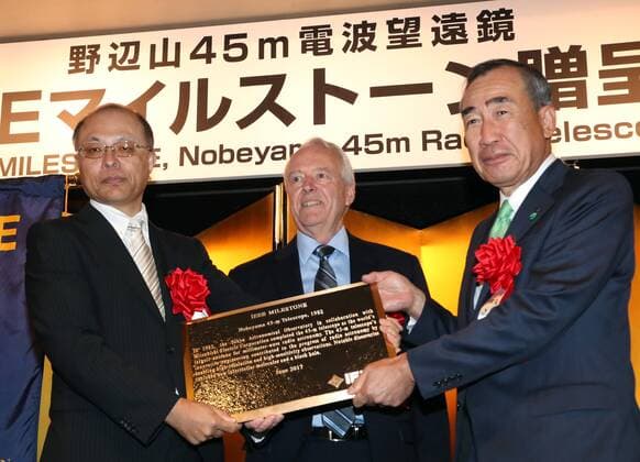 June 14, 2017, Tokyo, Japan - National Astronomical Observatory of Japan (NAOJ) Director General Masahiko Hayashi (L) and Mistubishi Electric president Masaki Sakuyama (R) receive a plaque of Institute of Electrical and Electronics Engineers (IEEE) Milestone award from IEEE president-elect James Jefferies (C) in Tokyo on Wednesday, June 14, 2017. NAOJ s Nobeyama 45-meters radio telescope has been recognized for an IEEE Milestone as the world s largestmillimeter-wave radio telescope to discover a supermassive black hole.  (lwxa011360)