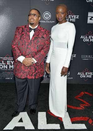 Danai Gurira and producer L.T. Hutton arrive for the premiere of All Eyez on Me at the Westwood Village Theaters in Los Angeles, California on June 14, 2017.  LAP20170614812 CHRISTINExCHEW