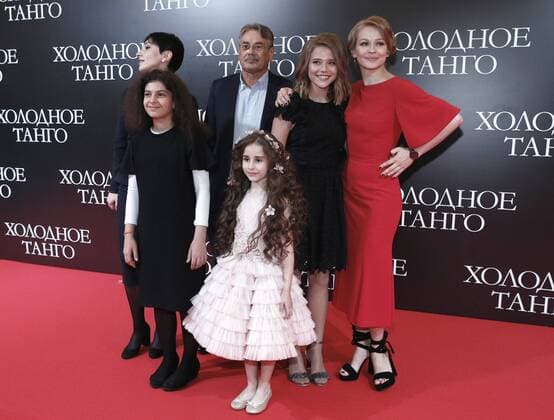 MOSCOW, RUSSIA - JUNE 15, 2017: Film producer Sabina Yeremeyeva, film director and screenwriter Pavel Chukhray, actresses Asya Gromova and Yulia Peresild (L-R back) pose at the Moscow premiere of Cold Tango, a film directed by Chukhray, at the Karo 11 Oktyabr cinema. Alexander Shcherbak TASS  TS053204