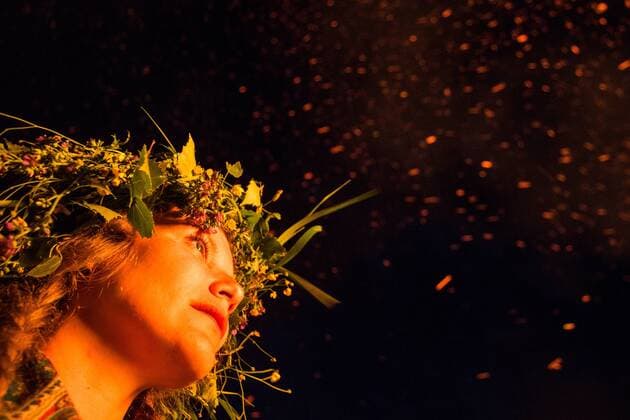 OMSK REGION, RUSSIA - JUNE 22, 2017: A girl wears a wildflower wreath during the Solntsestoyaniye (Solstice) ethnic festival in the village of Okunevo of Muromtsevsky District. Dmitry Feoktistov TASS  TS054368