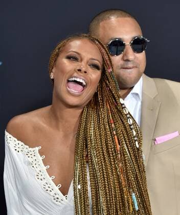 Eva Marcille (L) and guest attend the 17th annual BET Awards at Microsoft Theater in Los Angeles on June 25, 2017. The ceremony celebrates achievements in entertainment and honors music, sports, television, and movies released between April 1, 2016 and March 31, 2017.  LAP20170625485 CHRISTINExCHEW