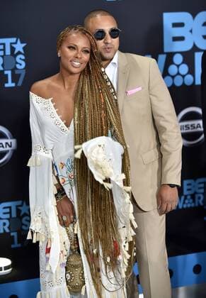 Eva Marcille (L) and guest attend the 17th annual BET Awards at Microsoft Theater in Los Angeles on June 25, 2017. The ceremony celebrates achievements in entertainment and honors music, sports, television, and movies released between April 1, 2016 and March 31, 2017.  LAP20170625486 CHRISTINExCHEW