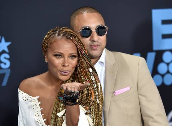 Eva Marcille (L) and guest attend the 17th annual BET Awards at Microsoft Theater in Los Angeles on June 25, 2017. The ceremony celebrates achievements in entertainment and honors music, sports, television, and movies released between April 1, 2016 and March 31, 2017.  LAP20170625487 CHRISTINExCHEW
