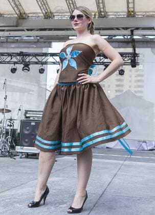(170629) -- TORONTO, June 29, 2017 -- A model presents a creation by the local indigenous designer during the fashion show of the 2017 Aboriginal History Month Celebration at Yonge-Dundas Square in Toronto, Canada, June 28, 2017. ) (jmmn) CANADA-TORONTO-ABORIGINAL HISTORY MONTH-FASHION SHOW ZouxZheng 
