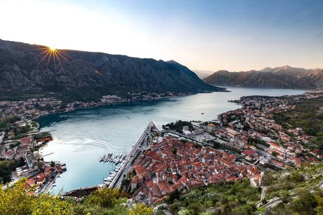 Looking over the old town of Kotor and across the Bay of Kotor viewed from the fortress at sunset, UNESCO World Heritage Site, Montenegro, Europe Copyright: MattxParry 1263-11