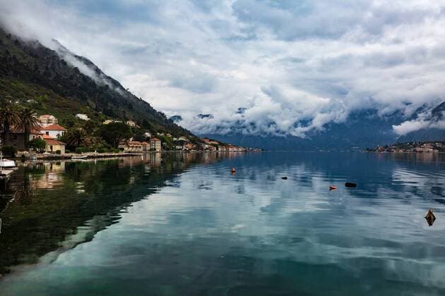 The village of Muo which faces Kotor across the bay, the mountains covered in low cloud, Montenegro, Europe Copyright: MattxParry 1263-16