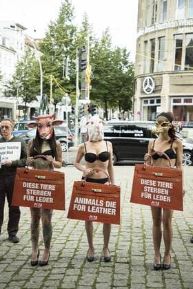 July 4, 2017 - Berlin, Germany - A group of people protest against the use of furs and leather in fashion before the beginning of the Mercedes-Benz Berlin Fashion Week Spring Summer 2018 in front of Jandorf Kaufhaus in Berlin, Germany on July 4, 2017. Berlin Germany  - ZUMAn230 20170704_zaa_n230_148 Copyright: xEmmanuelexContinix