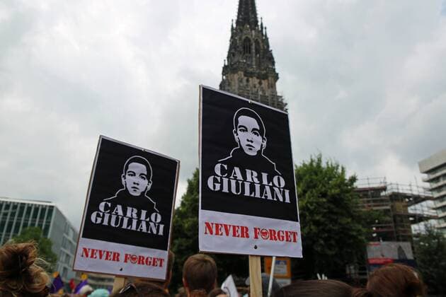 Hamburg: Peaceful protest against G20 Activists remembering Carlo Giuliani, who was killed by police 2001 at the protest against G8 in Genoa. Around 76.000 people gathered peacefully in Hamburg to protest against G20 and for solidarity.  AlexanderxPohl