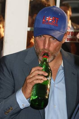 July 10, 2017 - New York, New York, U.S. - Actor WOODY HARRELSON drinks from a bottle of water before he walks the red carpet at the New York premiere of War for the Planet of the Apes held at SVA Theatre, New York U.S. - ZUMAk03_ 20170710_zaf_k03_070 Copyright: xNancyxKaszermanx