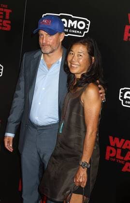 July 10, 2017 - New York, New York, U.S. - Actor WOODY HARRELSON and LAURA LOUIE attend the New York premiere of War for the Planet of the Apes held at SVA Theatre, New York U.S. - ZUMAk03_ 20170710_zaf_k03_085 Copyright: xNancyxKaszermanx