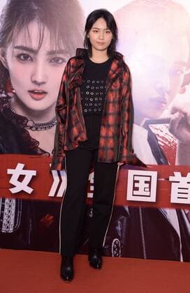 Chinese singer Zhou Bichang attends the world premiere for the Our Shining Days in Beijing, China, 16 July 2017. Li Bingbing shows up to preheat movie Our Shining Days in Beijing  pbu653473_08