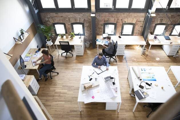 Colleagues working in modern office model released Symbolfoto property released  FKF02371