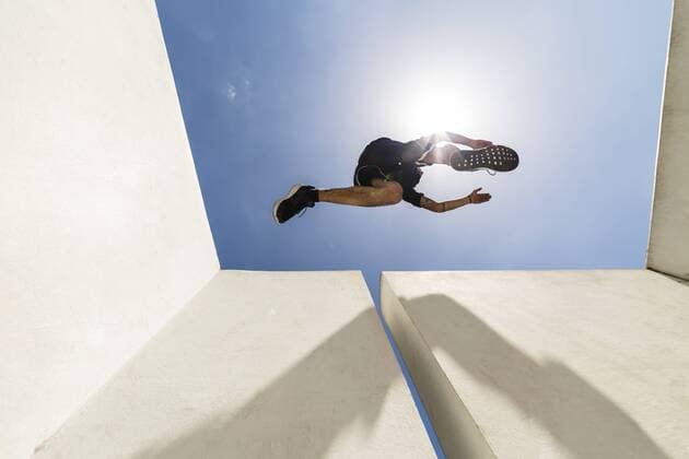 IMAGO Creative, Urban Lifestyle Man jumping in the city during a parkour session model released Symbolfoto  MGIF00010