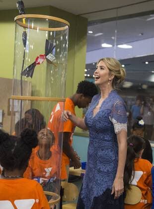 Ivanka Trump interacts and watches a science experiment in a wind tunnel after she and Education Secretary Betsy DeVos read Rosie Revere, Engineer to early grade school children at the Spark Lab at the National Museum of American History in Washington, DC on July 25, 2017. DeVos and Ivanka Trump focused the event on getting girls excited about STEM studies as they participated in certain science experiments.  WAS2017072527 PatxBenic