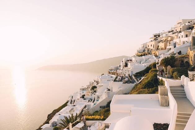 Greece, Santorini, Fira, white village view over the sea at sunset  GEMF01735