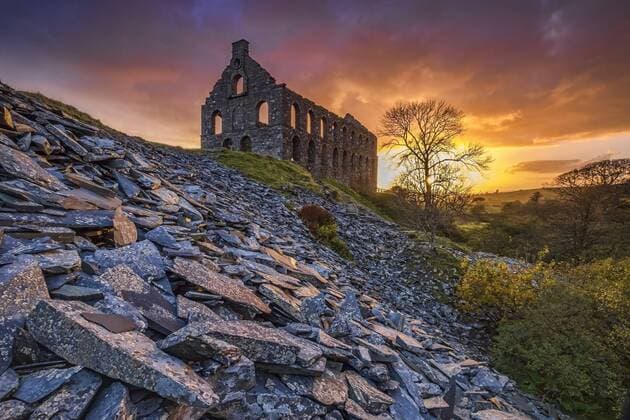 Ynys y Pandy disused slate mill and spoil heaps at sunset in Cwmystradllyn. Copyright: xAlanxNovelli LOOPxIMAGESx ANI0731703