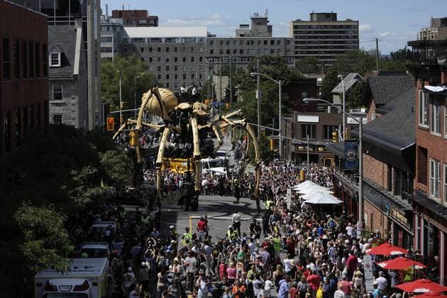 (170729) -- OTTAWA, July 29, 2017 -- Kumo, a giant mechanical spider brought by the company La Machine, takes part in the celebration of Canada s 150th birthday year, in Ottawa, Canada on July 28, 2017. The company La Machine brought their two giant creatures, the horse-dragon named Long Ma and the spider named Kumo, to roam the streets of Ottawa to be a part of the celebration for Canada s 150th birthday year. ) (zw) CANADA-OTTAWA-150TH BIRTHDAY-CELEBRATION DavidxKawai 
