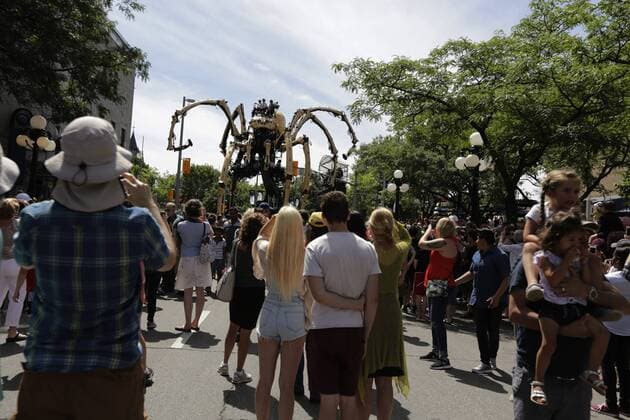 (170729) -- OTTAWA, July 29, 2017 -- Kumo, a giant mechanical spider brought by the company La Machine, takes part in the celebration of Canada s 150th birthday year, in Ottawa, Canada on July 28, 2017. The company La Machine brought their two giant creatures, the horse-dragon named Long Ma and the spider named Kumo, to roam the streets of Ottawa to be a part of the celebration for Canada s 150th birthday year. ) (zw) CANADA-OTTAWA-150TH BIRTHDAY-CELEBRATION DavidxKawai 