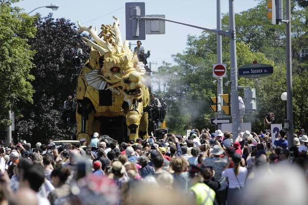 (170729) -- OTTAWA, July 29, 2017 -- Long Ma, a giant mechanical mythical horse brought by the company La Machine, takes part in the celebration of Canada s 150th birthday year, in Ottawa, Canada on July 28, 2017. The company La Machine brought their two giant creatures, the horse-dragon named Long Ma and the spider named Kumo, to roam the streets of Ottawa to be a part of the celebration for Canada s 150th birthday year. ) (zw) CANADA-OTTAWA-150TH BIRTHDAY-CELEBRATION DavidxKawai 