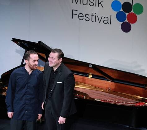 (170730) -- GEISENHEIM (GERMANY), July 30, 2017 -- Pianist Igor Levit (L) and tenor Simon Bode perform at the 30th Rheingau Music Festival at the Schloss Johannisberg in Geisenheim, Germany, July 29, 2017. ) (zw) GERMANY-GEISENHEIM-MUSIC LuoxHuanhuan 