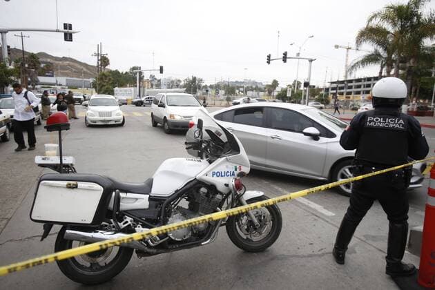July 31, 2017 - Tijuana, Baja California, Mexico - Tijuana, Baja California, USA July 31st, 2017 Opening of the Pedwest pedestrian entrance into Tijuana, Mexico. The transit police close the street towards Chaparral. Passengers are dropped off at the police tape. Ã‚Â© The San Diego Union Tribune 2017 Tijuana Mexico - ZUMAs44_ 20170731_zaf_s44_002 Copyright: xAlejandroxTamayox