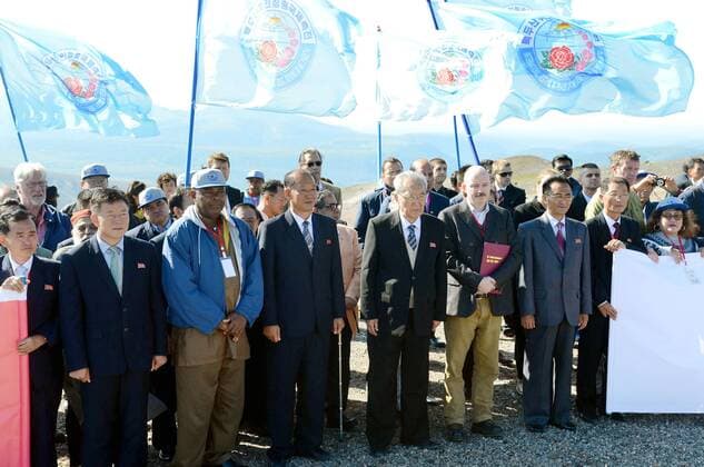 Rally on Mt. Paektu amid U.S.-N. Korea tensions Kim Ki Nam (5th from L in front), a vice chairman of the ruling Workers Party of Korea, attends a rally on Mt. Paektu, a mountain sitting on the North Korea-Chinese border, on Aug. 14, 2017 amid heightened tensions between Washington and Pyongyang. 