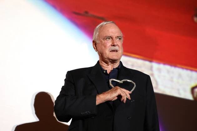 (170816) -- SARAJEVO, Aug. 16, 2017 -- British comedian John Cleese presents his award during the 23rd Sarajevo Film Festival (SFF), in Sarajevo, Bosnia and Herzegovina, on Aug. 16, 2017. John Cleese received Honorary Heart of Sarajevo Award during the 23rd Sarajevo Film Festival here on Wednesday. ) BOSNIA AND HERZEGOVINA-SARAJEVO-FILM FESTIVAL HarisxMemija 