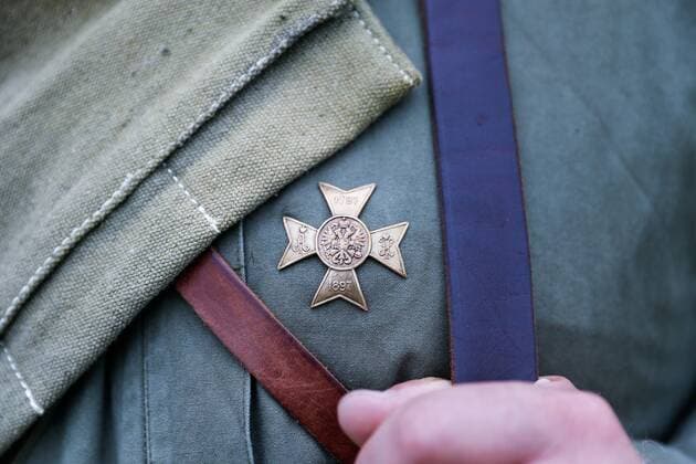 KALININGRAD REGION, RUSSIA - AUGUST 19, 2017: A participant wears a military decoration during a historical reenactment of the 1914 Battle of Gumbinnen between the Russian and the German Armies on the Eastern Front of World War I. The battle reenactment is performed as part of the Battle of Gumbinnen military and historical festival near the village of Lermontovo. Vitaly Nevar TASS  TS05BFED