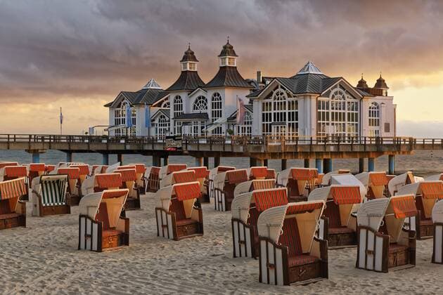 Germany, Mecklenburg-Western Pomerania, Baltic sea seaside resort Sellin, Hooded beach chairs on the beach  GFF00989