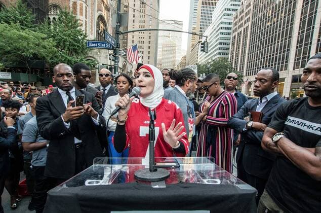 August 23, 2017 - New York City, New York, United States of America - Linda Sarsour on stage. New Yorkers rallied behind now-unsigned NFL player Colin Kaepernick who has remained seated during the singing of the US National Anthem since 2016. Kaepernick has stated I am not going to stand up to show pride in a flag for a country that oppresses black people and people of color.Ã¢â‚¬Â Kaepernick exercised his free agency option with the San Francisco 49ers and remains unsigned, which some see as a sign of a blacklisting in the NFL. Calls against Verizon were also made due to its 130 million in advertising with the NFL. New York City United States of America - ZUMAb160 20170823_zbp_b160_035 Copyright: xSachellexBabbarx
