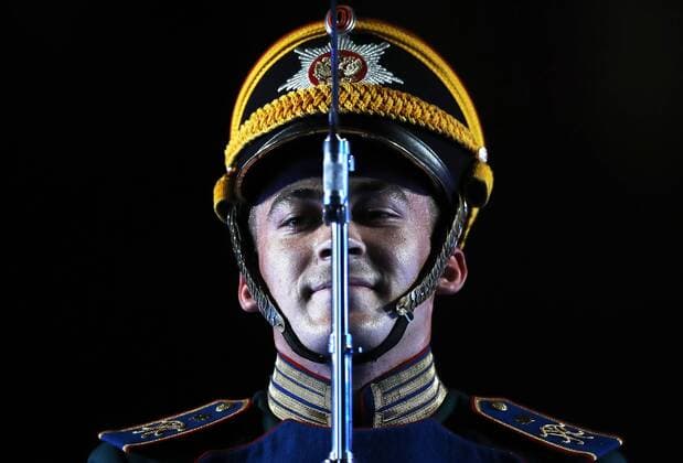 MOSCOW, RUSSIA - AUGUST 26, 2017: A member of the Honor Guard of the Russian Presidential Regiment performs at the opening ceremony of the 2017 Spasskaya Tower international military music festival in Moscow s Red Square. Sergei Savostyanov TASS  TS05D0C3
