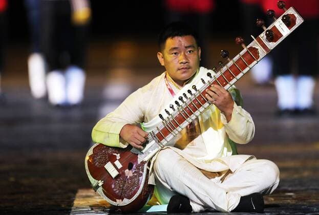 MOSCOW, RUSSIA - AUGUST 26, 2017: A member of the Indian Tri-Services Band performs at the opening ceremony of the 2017 Spasskaya Tower international military music festival in Moscow s Red Square. Sergei Savostyanov TASS  TS05D0D9