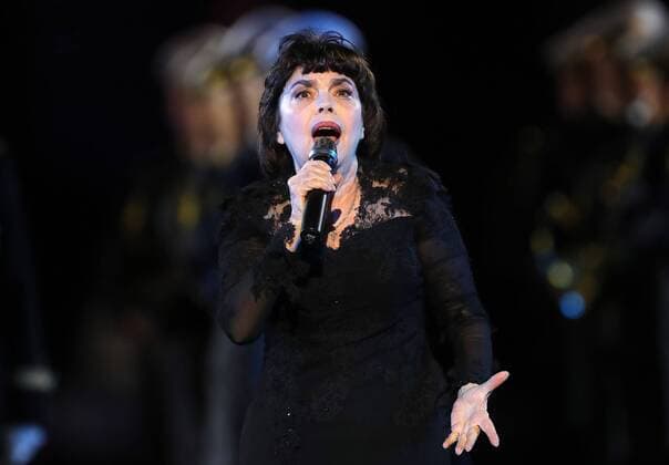 MOSCOW, RUSSIA - AUGUST 26, 2017: French singer Mireille Mathieu performs at the opening ceremony of the 2017 Spasskaya Tower international military music festival in Moscow s Red Square. Sergei Savostyanov TASS  TS05D119