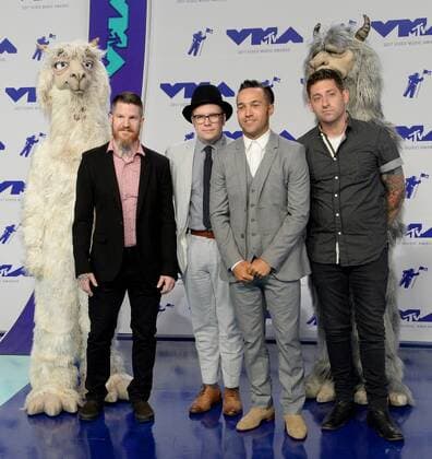 (L-R) Andy Hurley, Patrick Stump, Pete Wentz and Joe Trohman of Fall Out Boy arrive for the 34th annual MTV Video Music Awards at The Forum in Inglewood, California on August 27, 2017.  LAP201708270386 JIMxRUYMEN