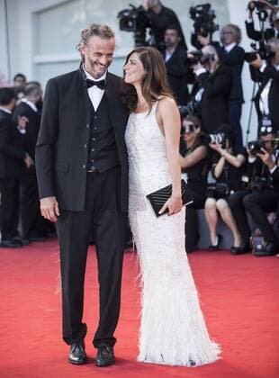 (170830) -- VENICE, Aug. 30, 2017 -- Actress and the jury member of the 74th edition of the Venice Film Festival competition Anna Mouglalis (R) arrives on the red carpet of the premiere of the film Downsizing which opens the 74th edition of the Venice Film Festival in Venice, Italy, on Aug. 30, 2017. The 74th edition of the Venice Film Festival lasts from Aug. 30 to Sept. 9. ) ITALY-VENICE-FILM FESTIVAL-OPENING CEREMONY-RED CARPET JinxYu 